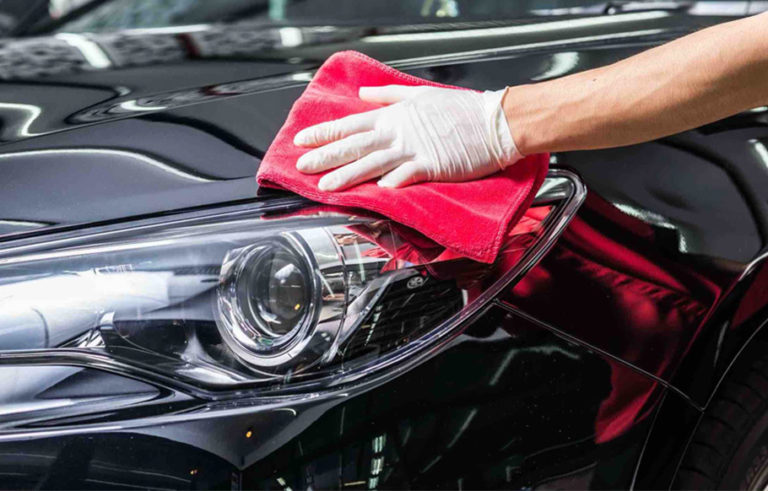 Buffing car with microfibre towel